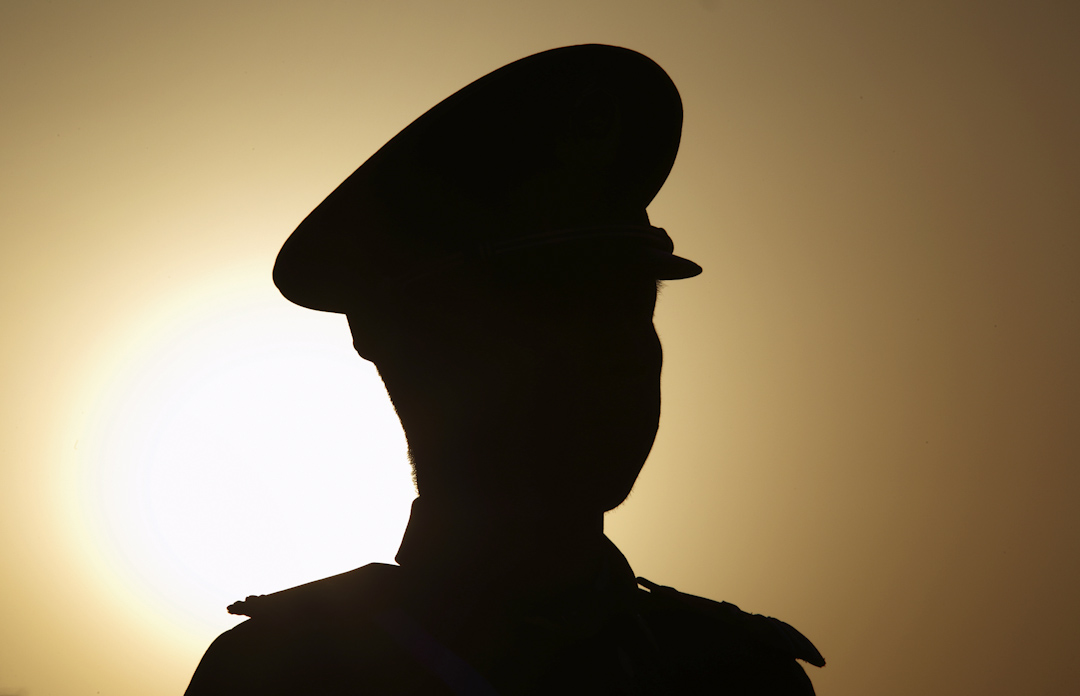 2015年3月15日，中國第十二屆全國人大三次會議閉幕，天安門廣場一名警察站崗。