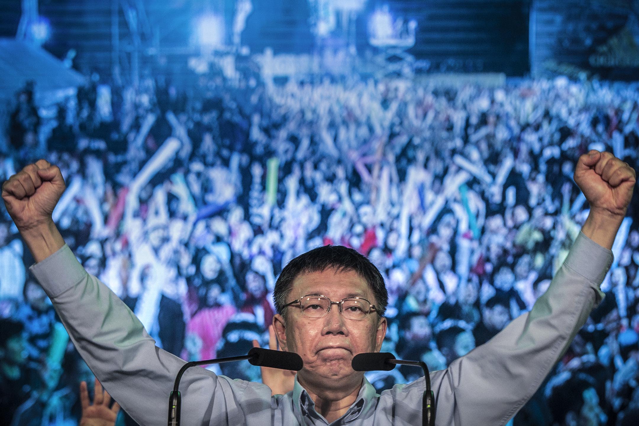 寻求连任的台北市长柯文哲确定以3254票,小于千分之三的得票差距击败国民党提名的丁守中,连任台北市长。