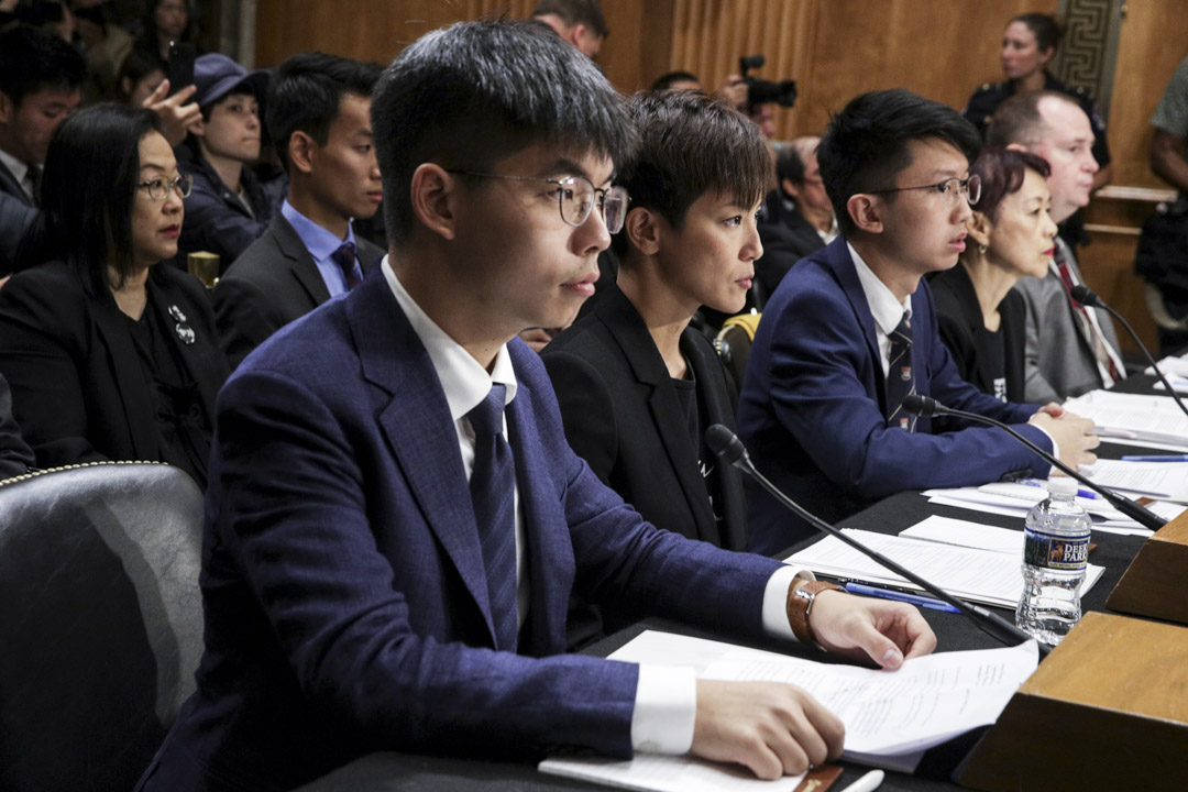 2019年9月17日,谭竞嫦(前排右二)与黄之锋、何韵诗等出席在华盛顿举行的美国国会听证会。