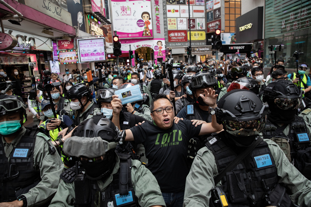 2020年5月24日,市民在香港島一帶發起反對國安法及國歌法遊行,人民力量副主席譚得志被捕。攝:陳焯煇/端傳媒