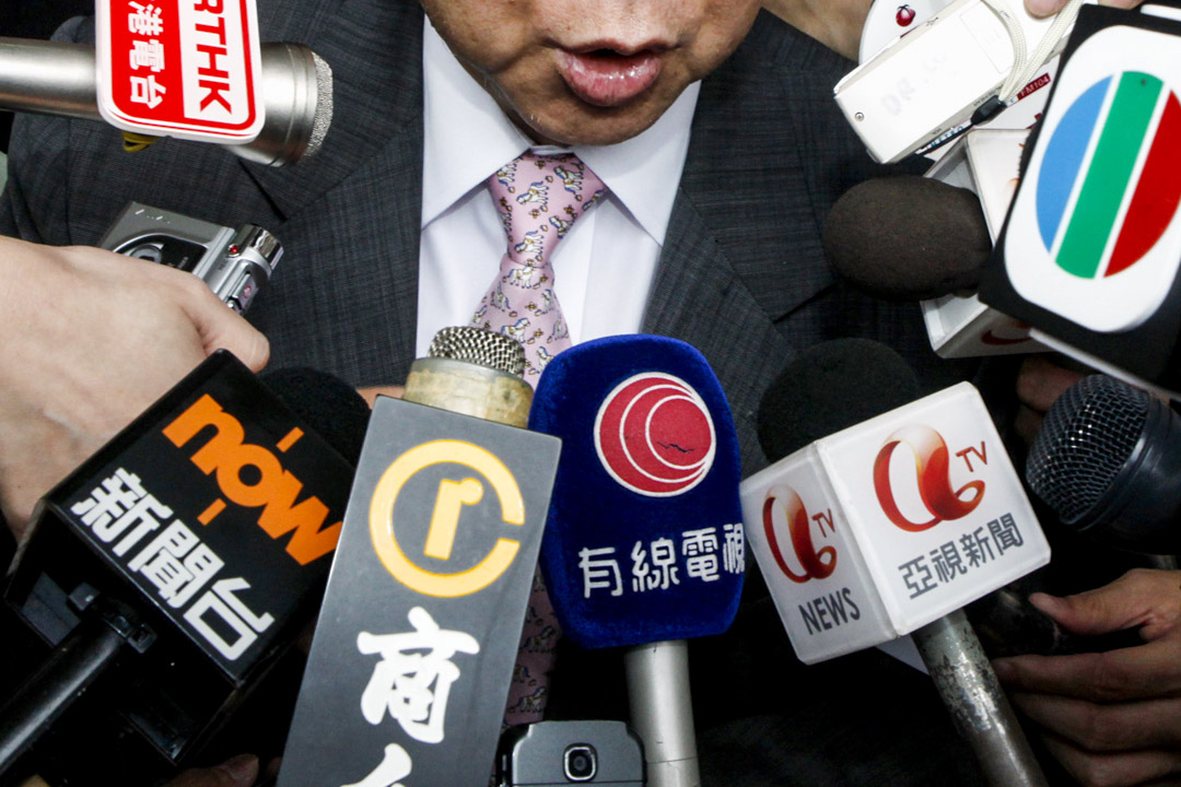 2010年6月8日,土地拍賣現場的記者。