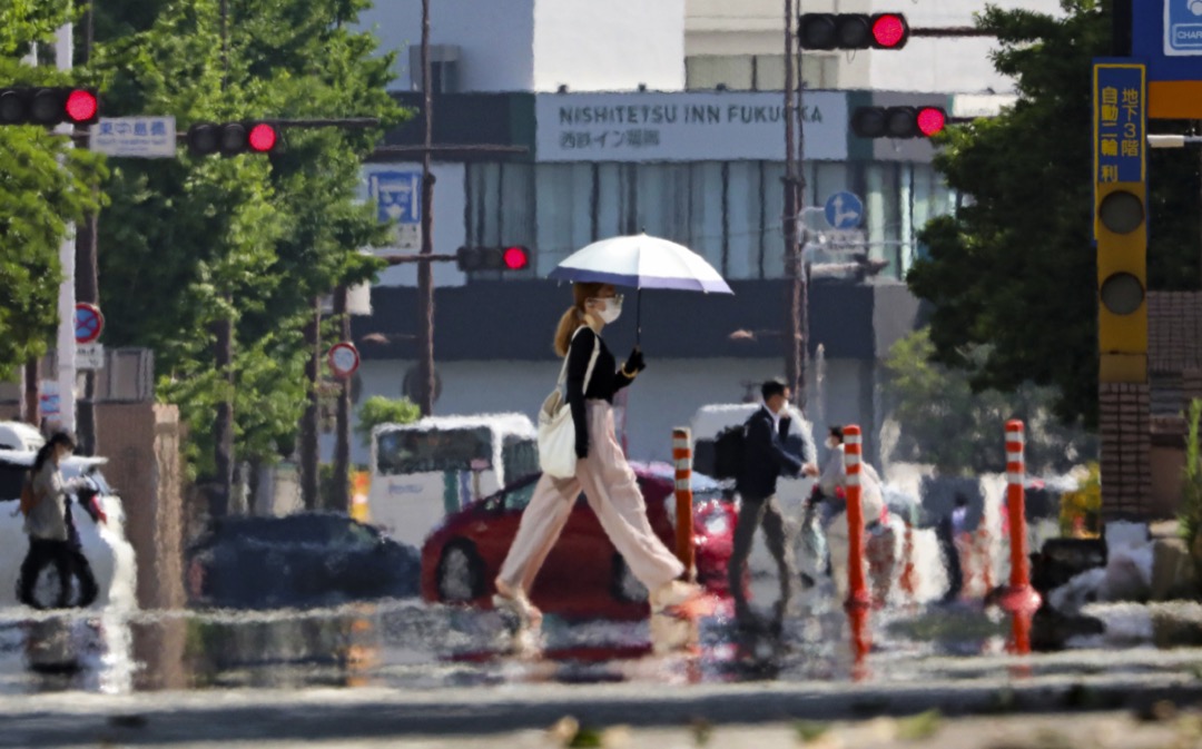 2022年6月30日,日本福岡市,高溫令市內街道出現海市蜃樓現象。