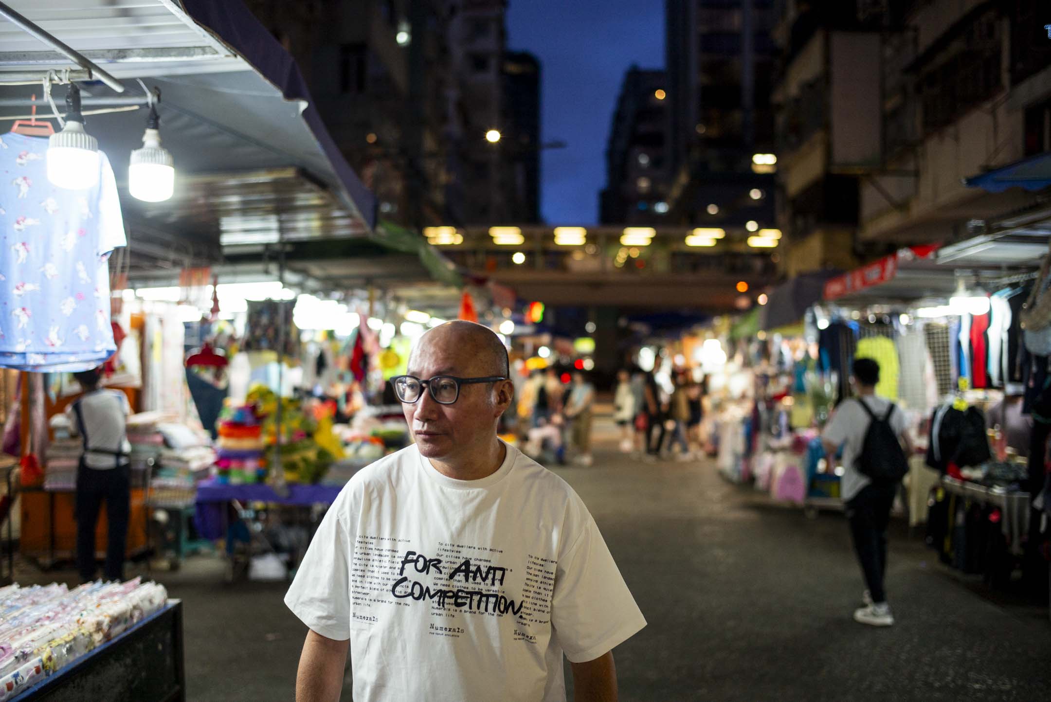 香港理工大學應用社會科學系專任導師、聯區小販發展平台成員梁志遠。攝:林振東/端傳媒