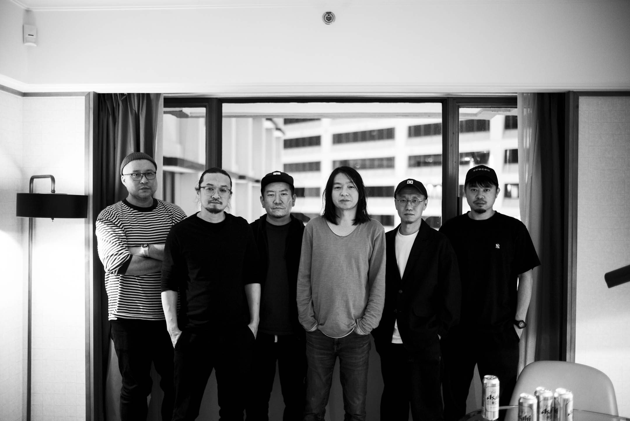 中国后摇滚乐队惘闻,乐队目前由吉他手谢玉岗、吉他手耿鑫、贝斯手徐增铮、鼓手周连江、键盘手张岩峰和号手黄凯组成。摄:林振东/端传媒