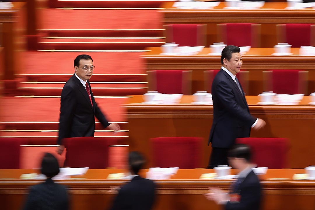 温克坚:中共18大以来,敏感的人们可以感受到,寻求扩张权力的政治领导层和官僚体制之间出现了结构性张力,两者之间已经出现越来越深的裂痕。图为中国国家主席习近平和总理李克强出席全国人大会议。摄:Feng Li/Getty