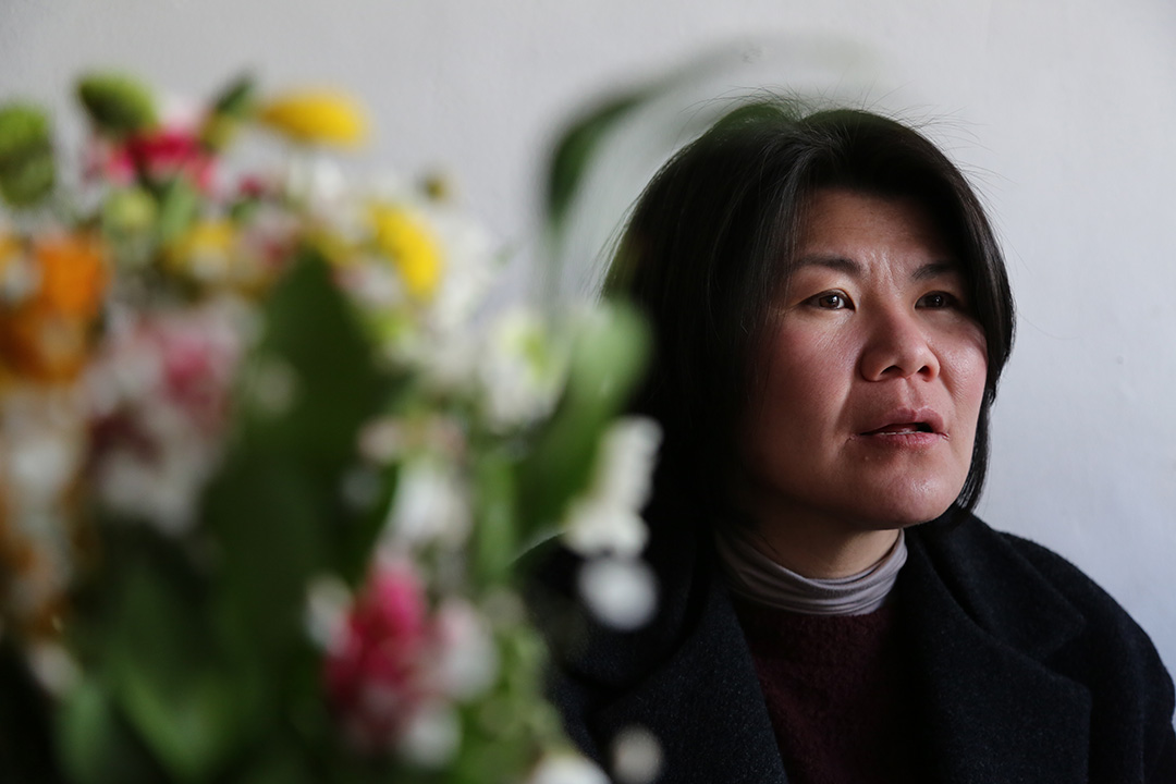 47歲的金少英和夥伴一齊推動社區能源運動,成為首爾能源自主社區的雛形。攝:孫賢亮/端傳媒